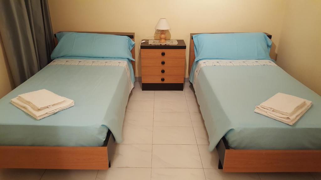 Postel nebo postele na pokoji v ubytování Ca Tibaria