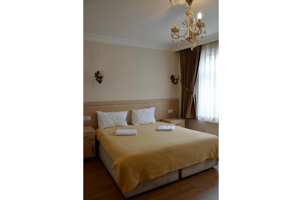 Ένα ή περισσότερα κρεβάτια σε δωμάτιο στο Piya Boutique Hotel