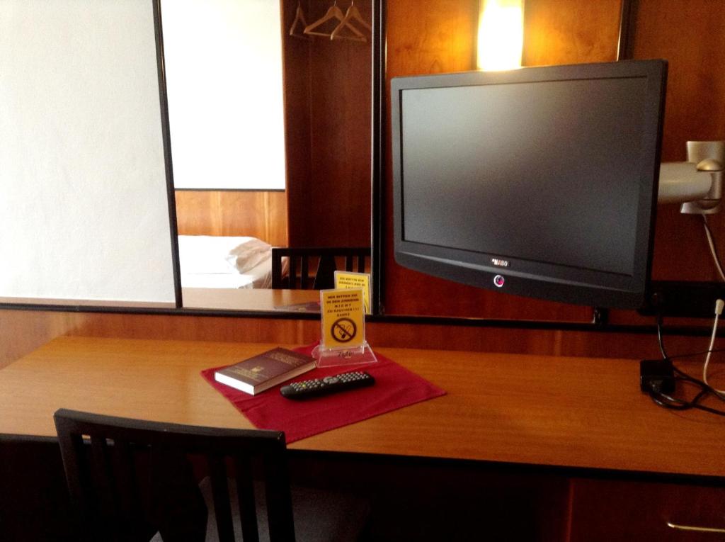 TV a/nebo společenská místnost v ubytování Hotel Gasthof Sonne