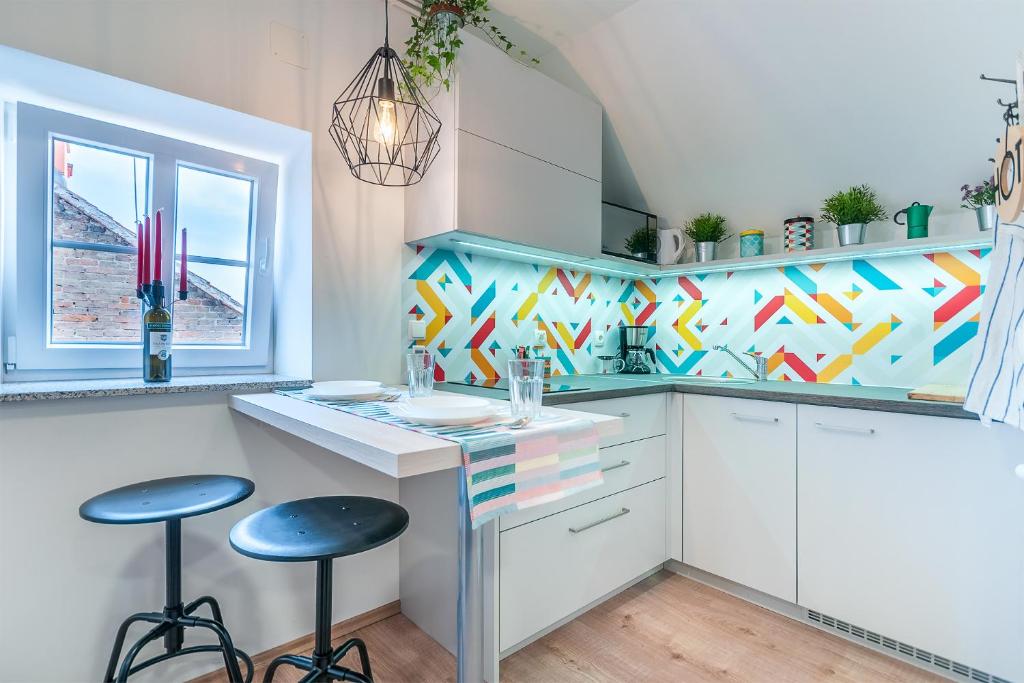 Kuchyň nebo kuchyňský kout v ubytování TOP Apartman