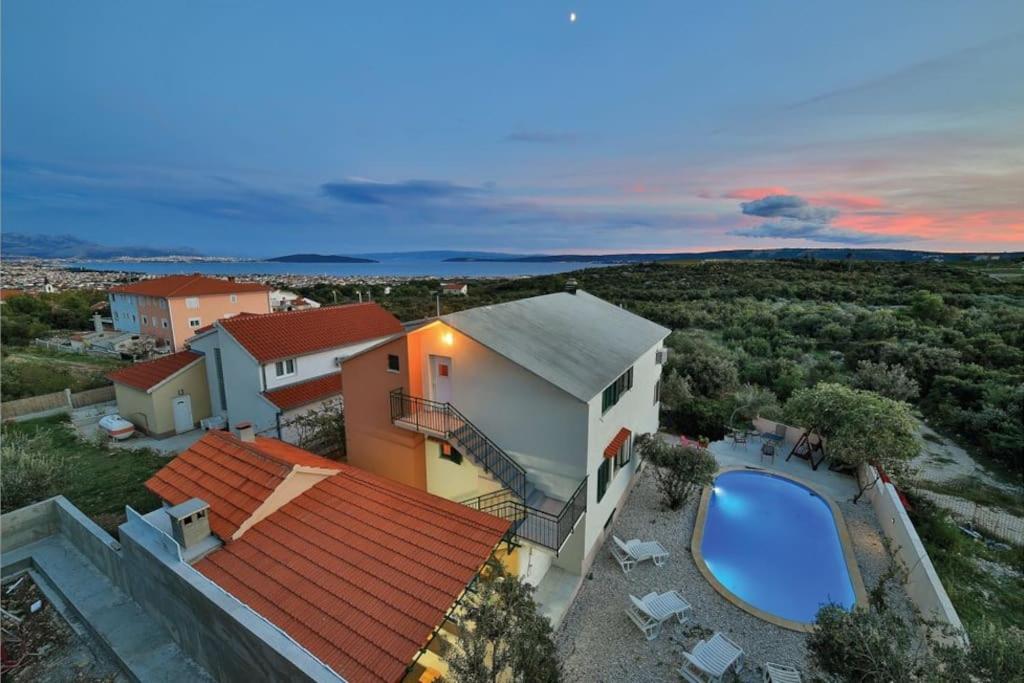 an aerial view of a house with a swimming pool at Mirta in Kastel Novi