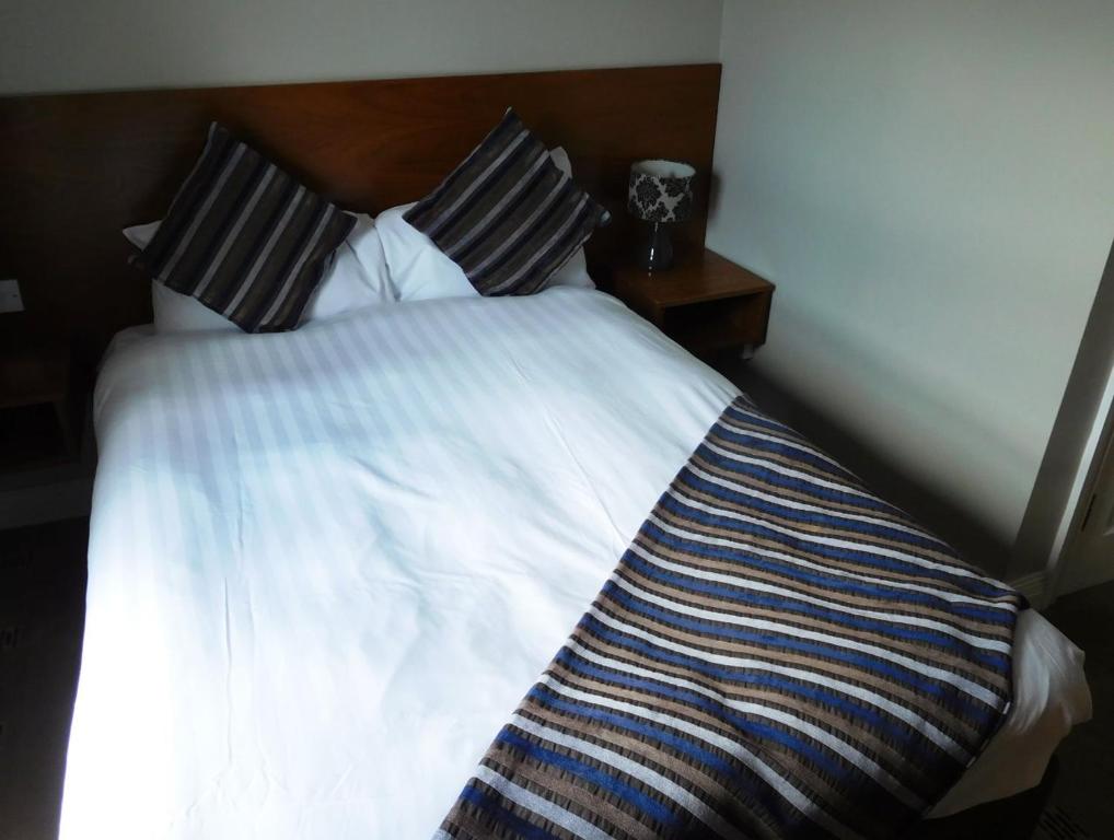 Postel nebo postele na pokoji v ubytování Anam Cara B&B