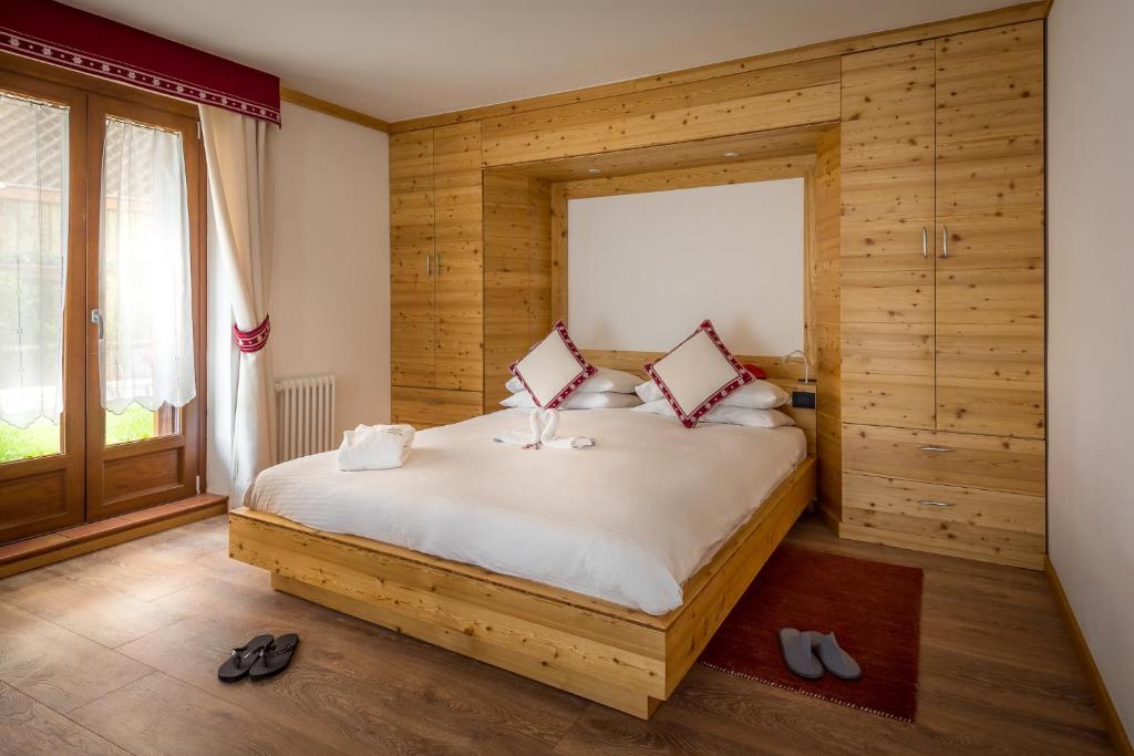 Postel nebo postele na pokoji v ubytování Hotel St. Raphael