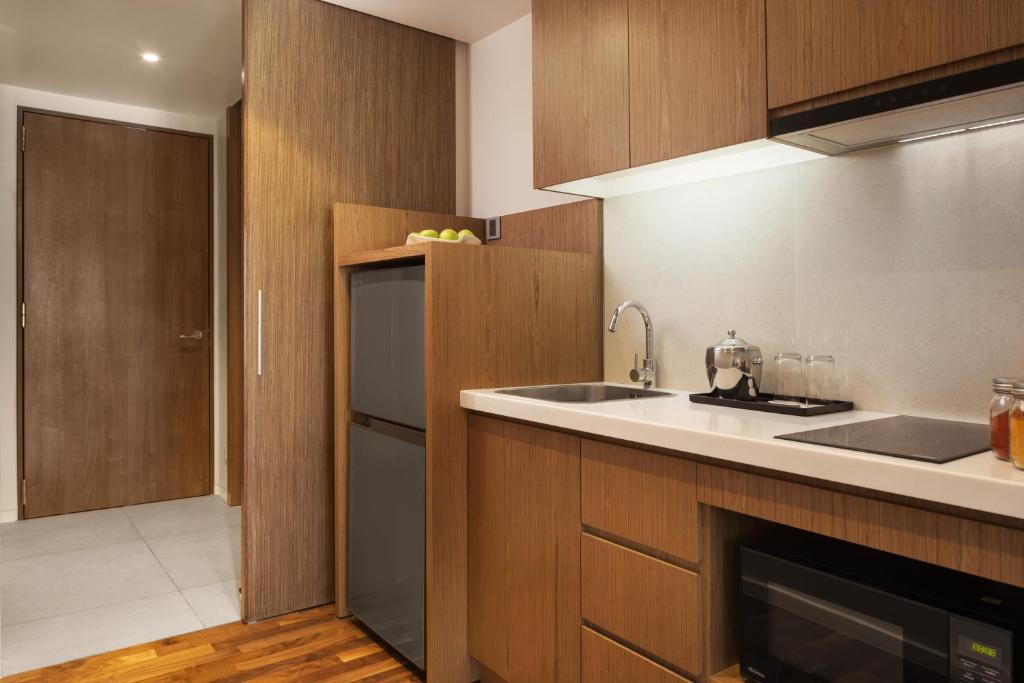 Kuchyň nebo kuchyňský kout v ubytování Hotel Emion Phnom Penh