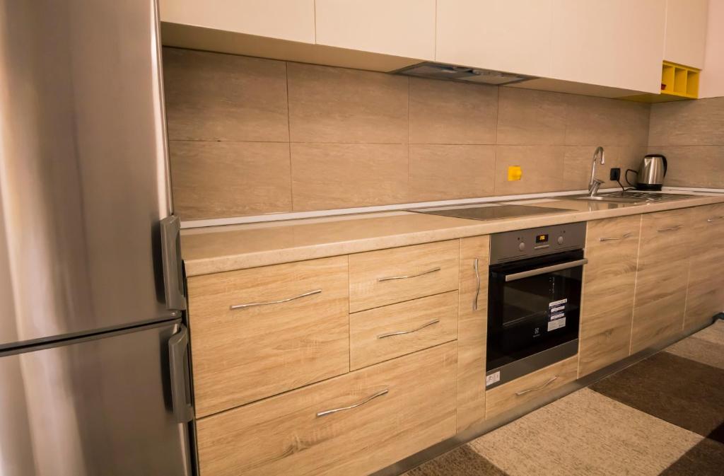 Kuchyň nebo kuchyňský kout v ubytování Hotel Pandora Residence