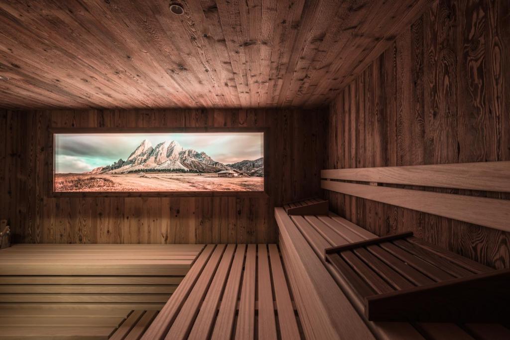 TV a/nebo společenská místnost v ubytování Hotel B&B Feldmessner