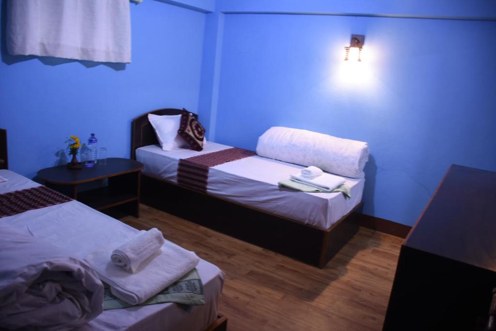 Postel nebo postele na pokoji v ubytování Subha Guest House