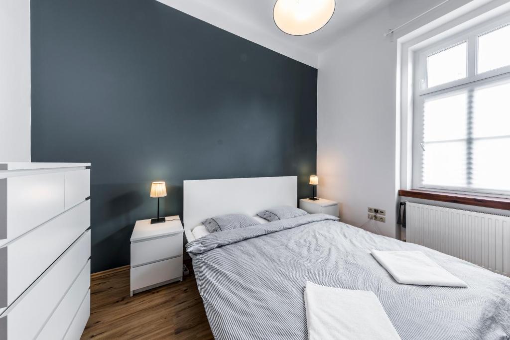 Postel nebo postele na pokoji v ubytování French Touch Apartment with Free Parking