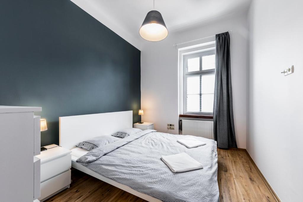 Postel nebo postele na pokoji v ubytování French Touch Apartment with Free Parking