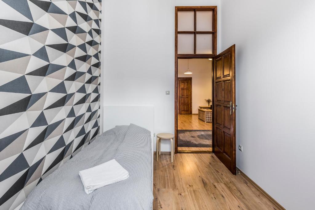Postel nebo postele na pokoji v ubytování French Touch Apartment with Free Parking