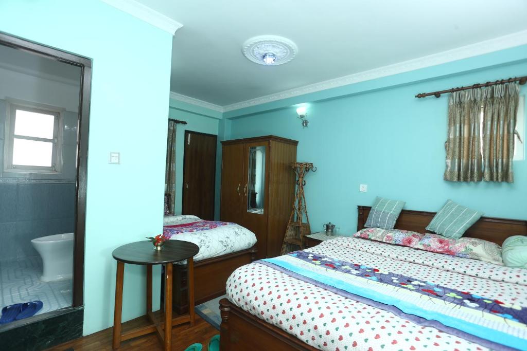 Postel nebo postele na pokoji v ubytování Delights Home
