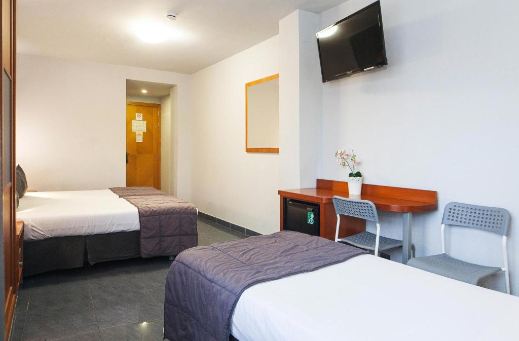Postel nebo postele na pokoji v ubytování HOTEL SANT PERE ll HSPII
