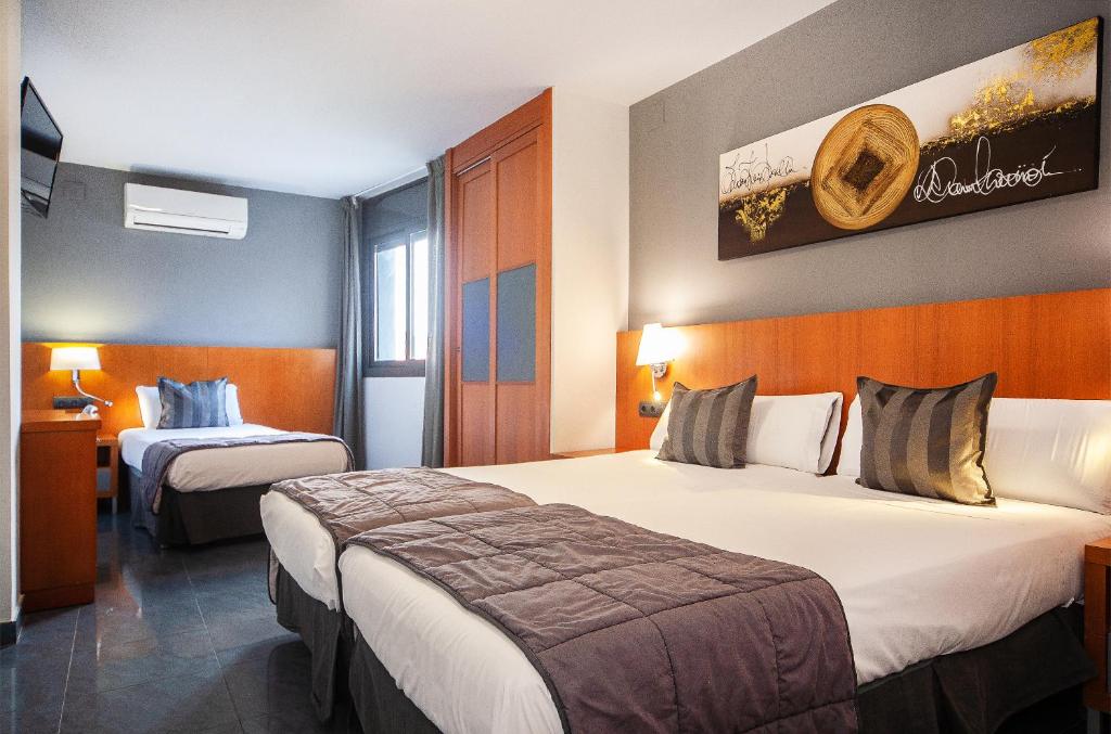 Postel nebo postele na pokoji v ubytování HOTEL SANT PERE ll HSPII