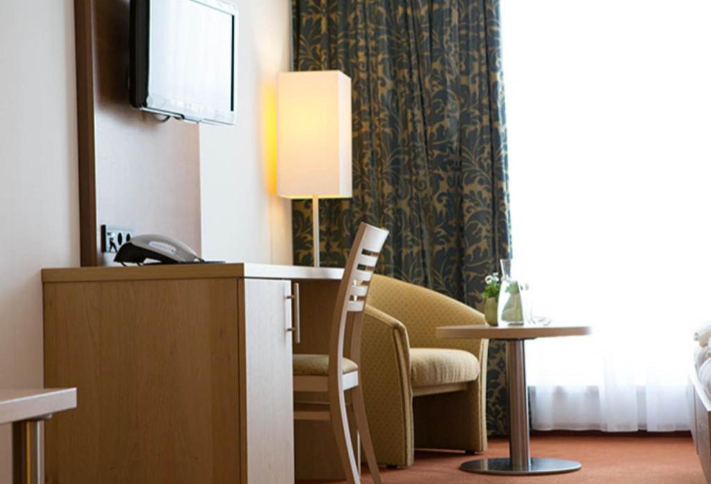 TV a/nebo společenská místnost v ubytování Hotel Gasthof Lamm