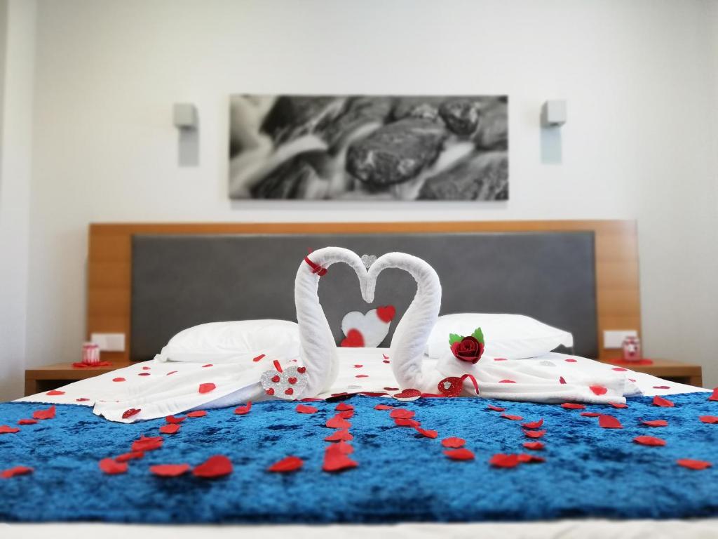 Postel nebo postele na pokoji v ubytování Whalesbay Hotel Apartamentos