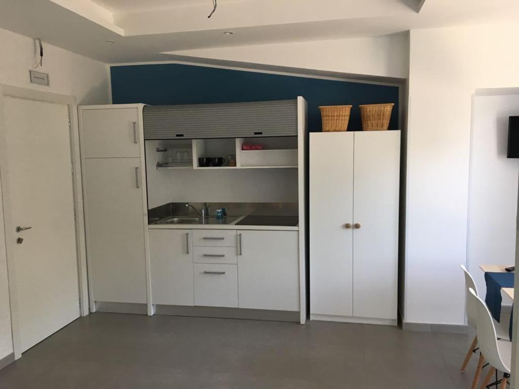 Kuchyň nebo kuchyňský kout v ubytování Golden Beach Residence