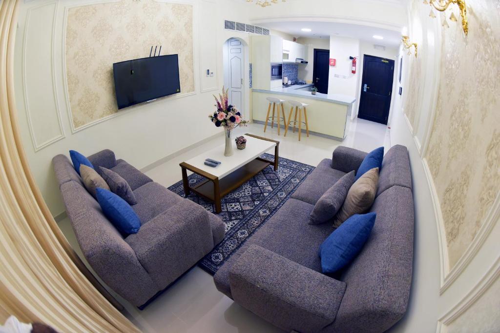 TV a/nebo společenská místnost v ubytování A'Sinamar Hotel Apartment