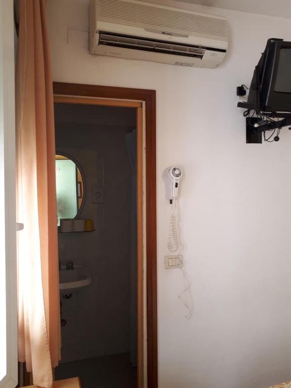 TV a/nebo společenská místnost v ubytování Hotel Ottavia