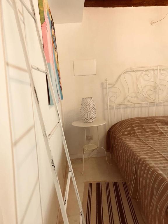 Posteľ alebo postele v izbe v ubytovaní Tambien B&B