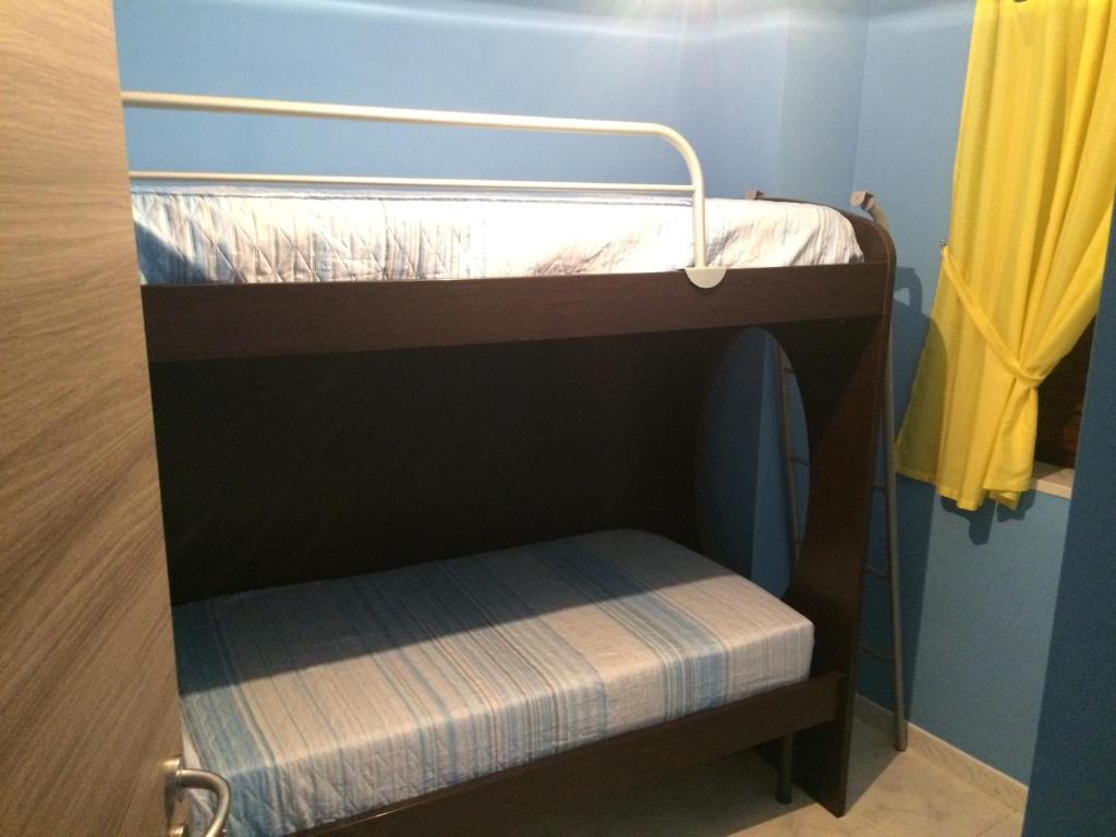 Postel nebo postele na pokoji v ubytování casa vacanza EVERY DAY