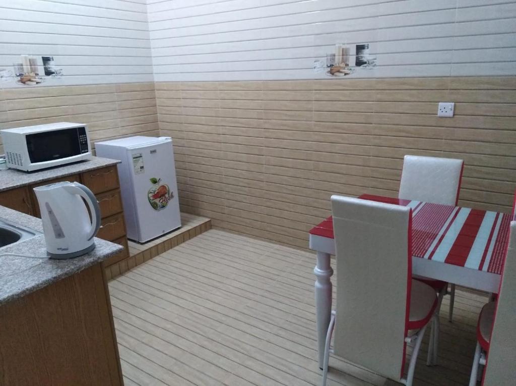 Kuchyň nebo kuchyňský kout v ubytování Dar ALHamra Inn