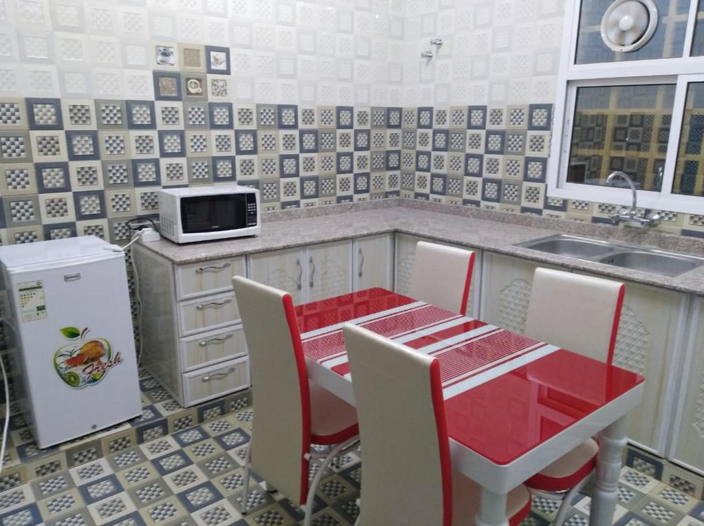Kuchyň nebo kuchyňský kout v ubytování Dar ALHamra Inn