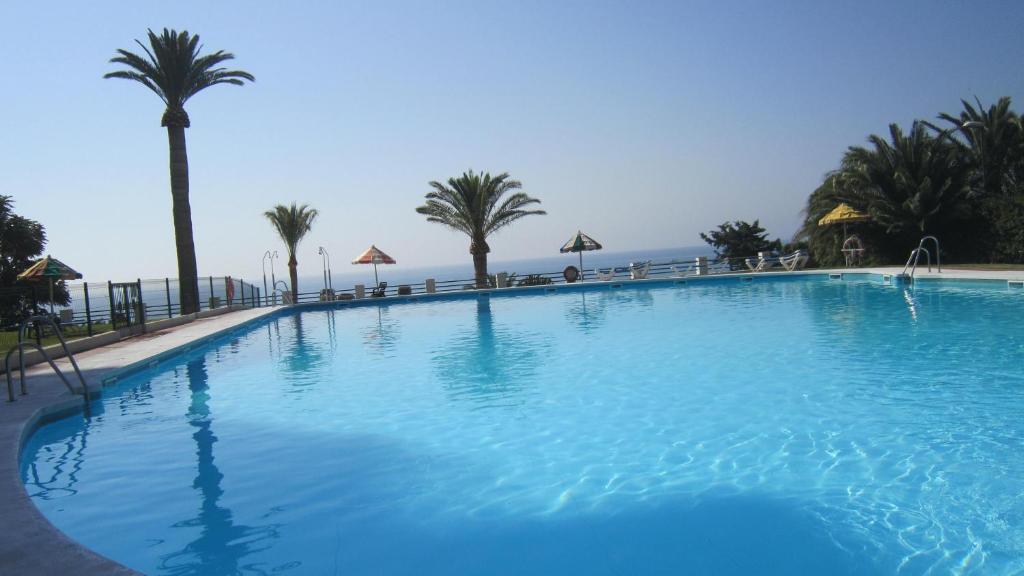 The swimming pool at or close to La Torre De La Roca