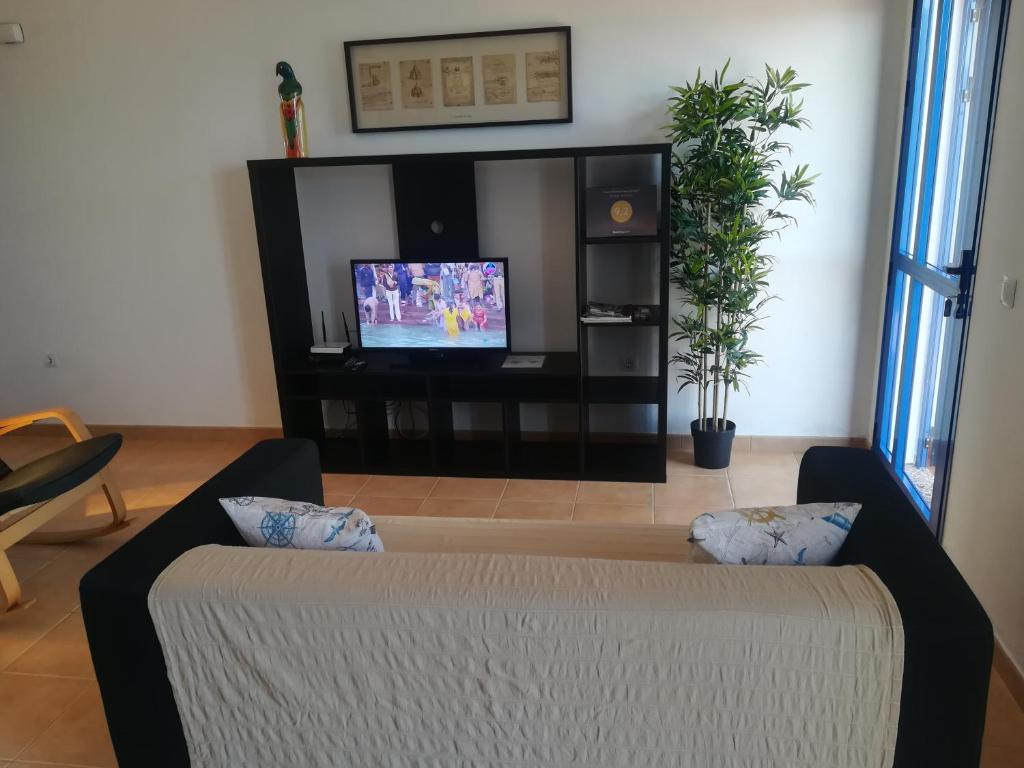 TV a/nebo společenská místnost v ubytování Odamar de Orzola