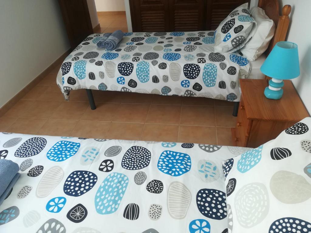 Postel nebo postele na pokoji v ubytování Odamar de Orzola