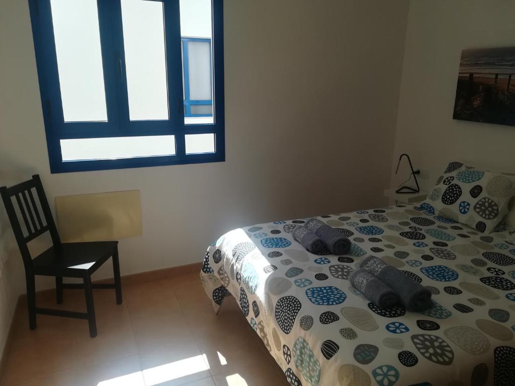 Postel nebo postele na pokoji v ubytování Odamar de Orzola