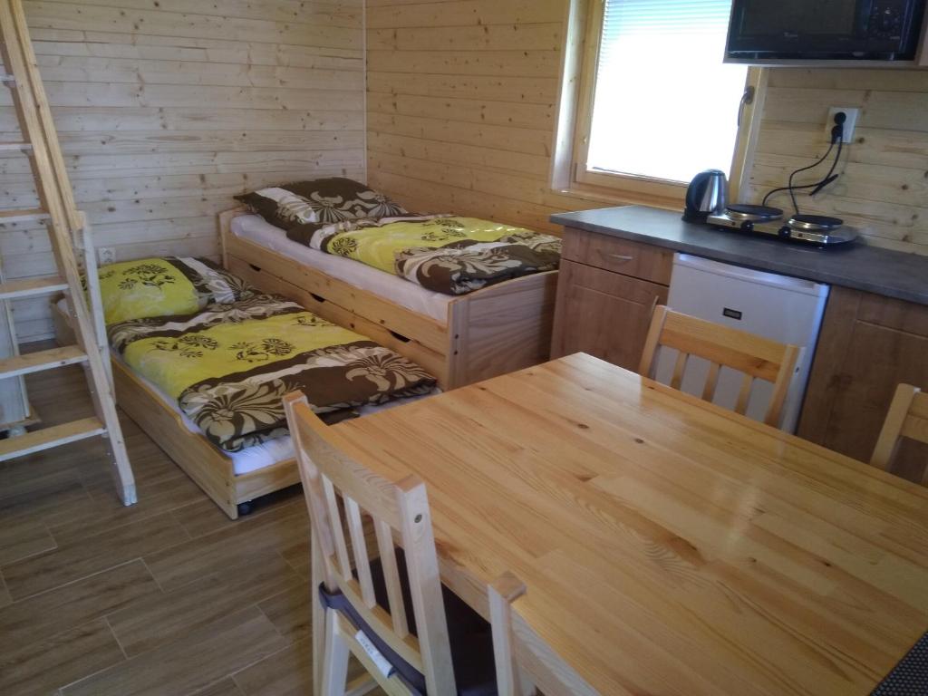Postel nebo postele na pokoji v ubytování Chata Nový Přerov