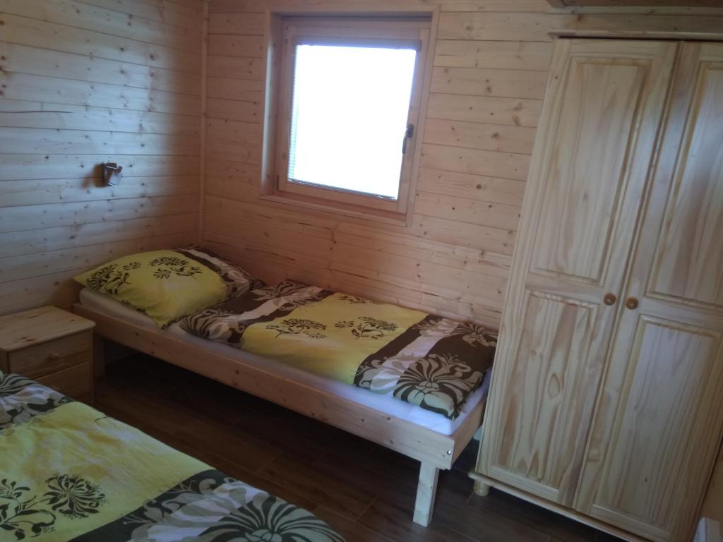 Postel nebo postele na pokoji v ubytování Chata Nový Přerov