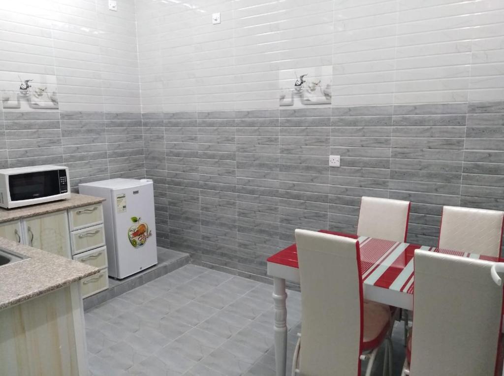 Kuchyň nebo kuchyňský kout v ubytování Dar ALHamra Inn