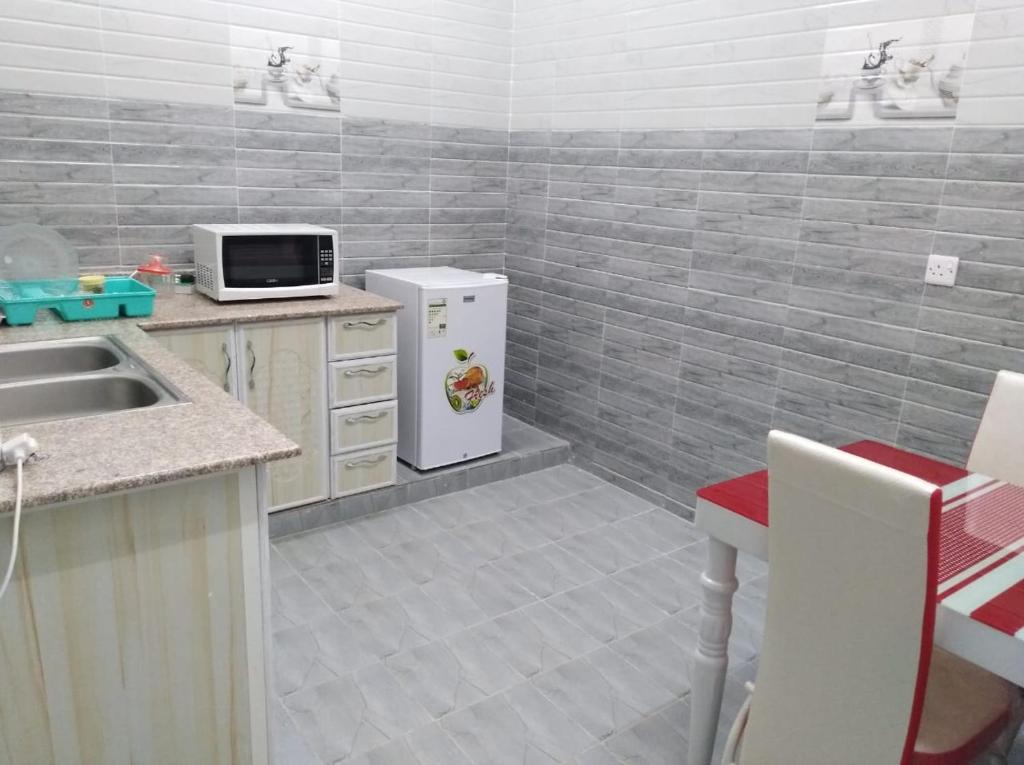 Kuchyň nebo kuchyňský kout v ubytování Dar ALHamra Inn