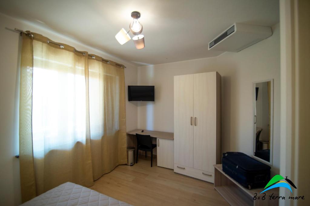 TV a/nebo společenská místnost v ubytování B&B Terra Mare