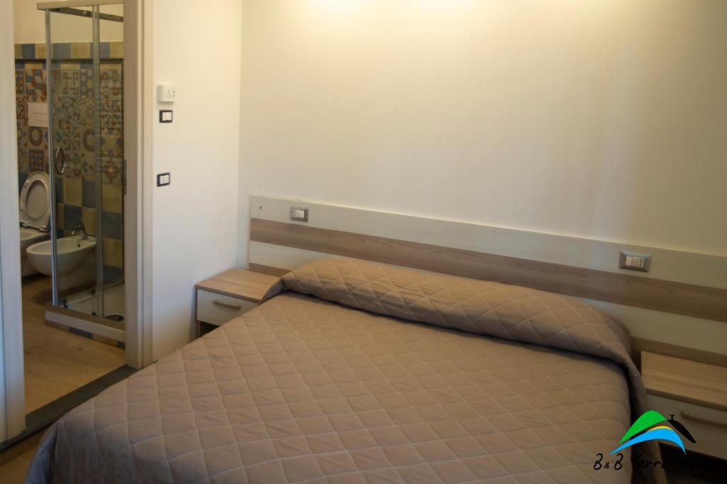 Postel nebo postele na pokoji v ubytování B&B Terra Mare