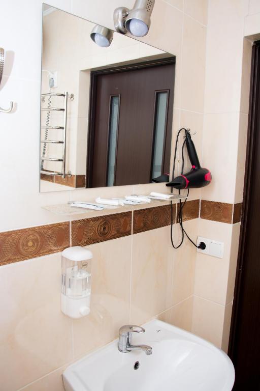 Koupelna v ubytování Faraon Hotel