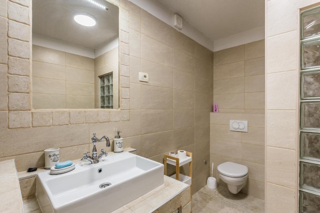 Kúpeľňa v ubytovaní Villa JJ