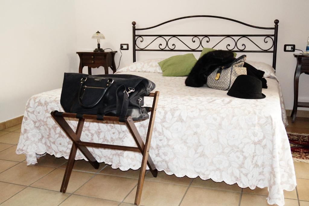 Postel nebo postele na pokoji v ubytování Bed And Breakfast Il Garoch