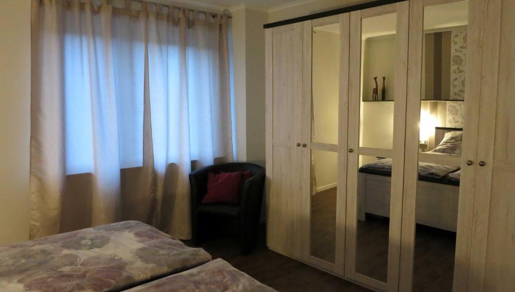 Postel nebo postele na pokoji v ubytování Sauerland Juwel