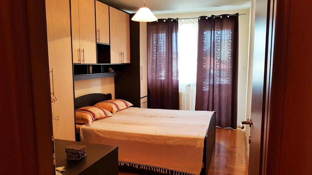 Postel nebo postele na pokoji v ubytování Apartman Pullum