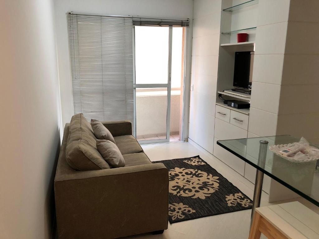 Zona de estar de Loft com academia e piscina no coração de São Paulo