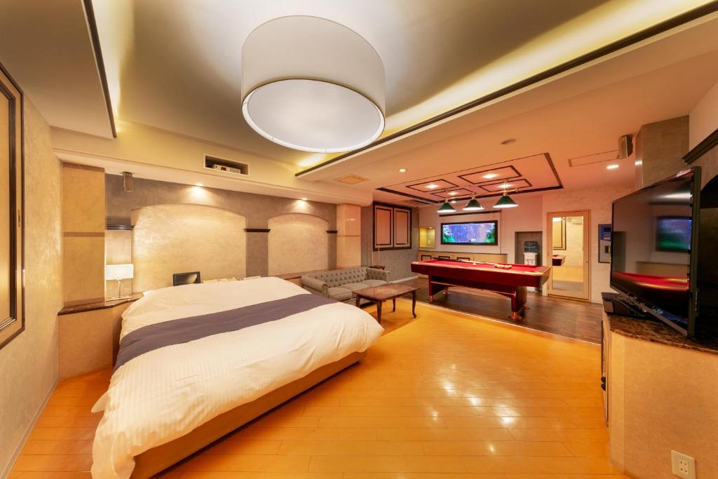 TV a/nebo společenská místnost v ubytování Hotel Luna Kashiba (Adult Only)