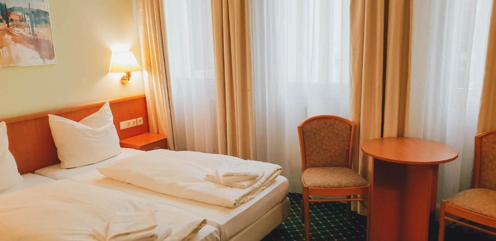 Postel nebo postele na pokoji v ubytování Hotel "Helle Mitte" Berlin