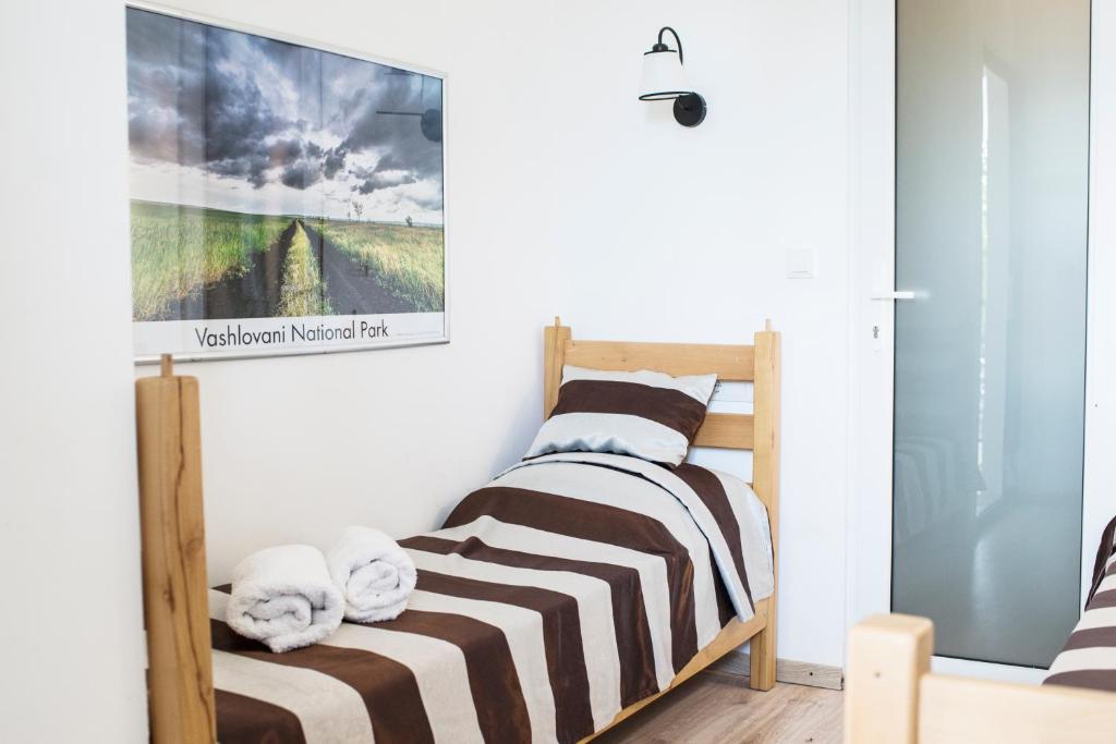 Postel nebo postele na pokoji v ubytování Chateau Napareuli