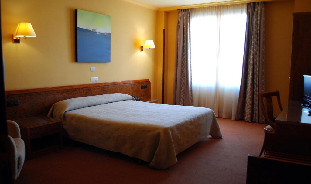 Postel nebo postele na pokoji v ubytování Hotel Gernika - Adults Only