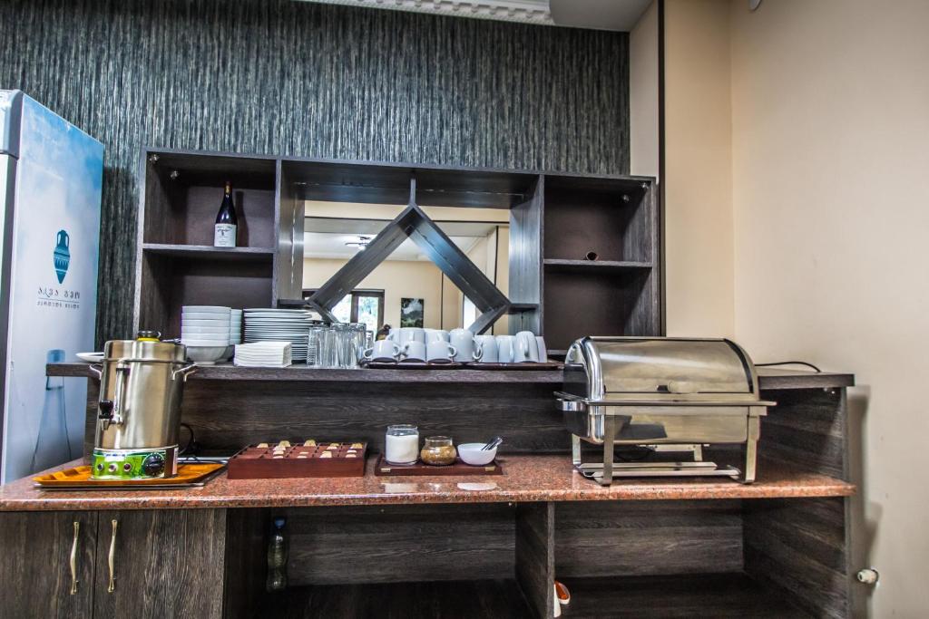 Kuchyň nebo kuchyňský kout v ubytování Hotel Svanseti