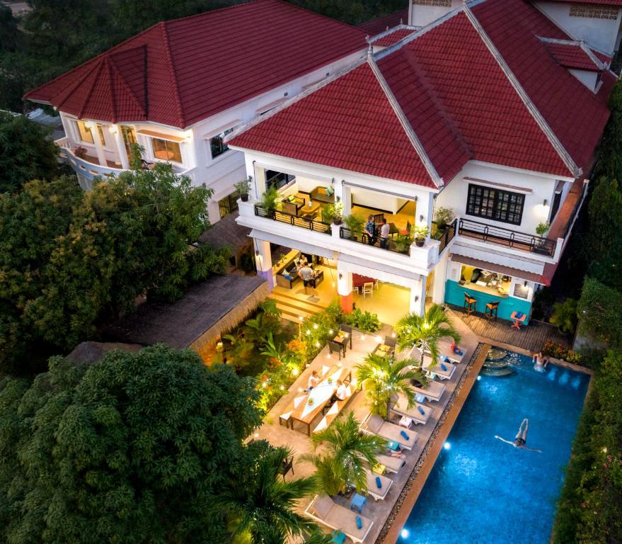 an aerial view of a house with a pool at Baby Elephant Boutique Hotel in Siem Reap