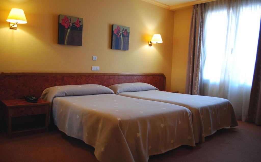 Postel nebo postele na pokoji v ubytování Hotel Gernika - Adults Only