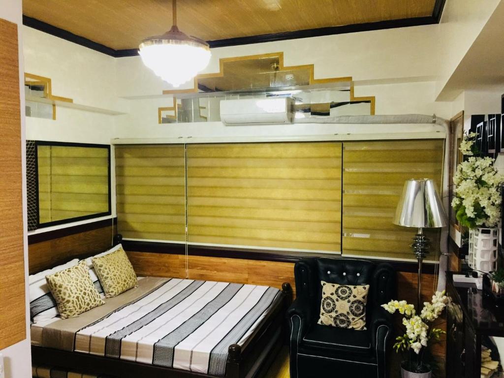 Postel nebo postele na pokoji v ubytování Condotel